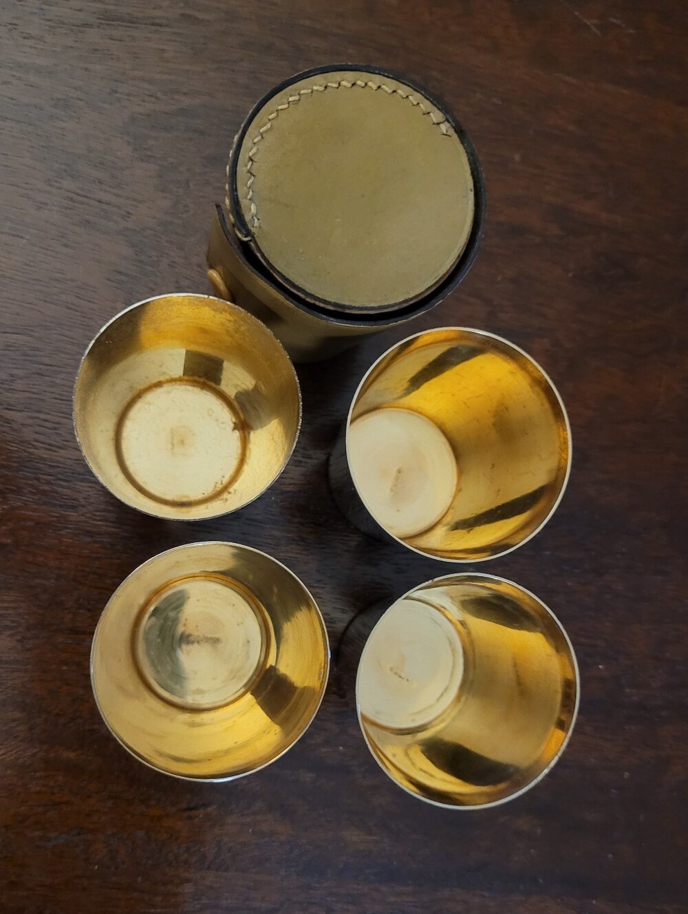 5 - Vintage German nesting shot glass set of 4 with a leather case.